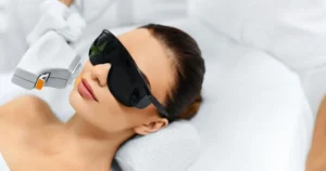 Patient receiving IPL Treatment for Brown and Red Spots in East Greenwich, RI